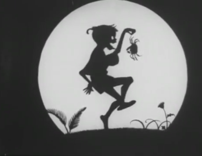 The silhouette image of a boy dancing while holding a crab by its legs