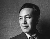 Photo of Uchida Tomu and a suit and tie in the 1940s