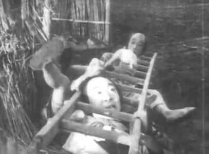 Several Japanese men in feudal dress stuck in the rungs of a ladder