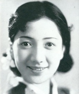 Portrait of a smiling Japanese woman directly facing the camera