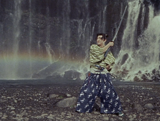 A samurai wields a sword with a raging waterfall behind him