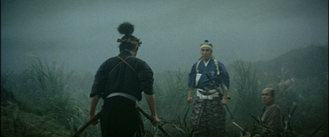 On a foggy evening, two samurai face each other as if about to attack